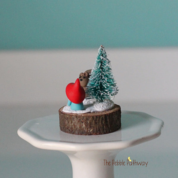 Micro mini gnome with tiny squirrel and Christmas tree on wood slice - ThePebblePathway