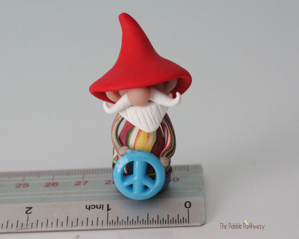 Hippie Gnome with tie dye shirt and blue peace sign