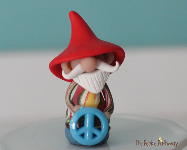 Hippie Gnome with tie dye shirt and blue peace sign