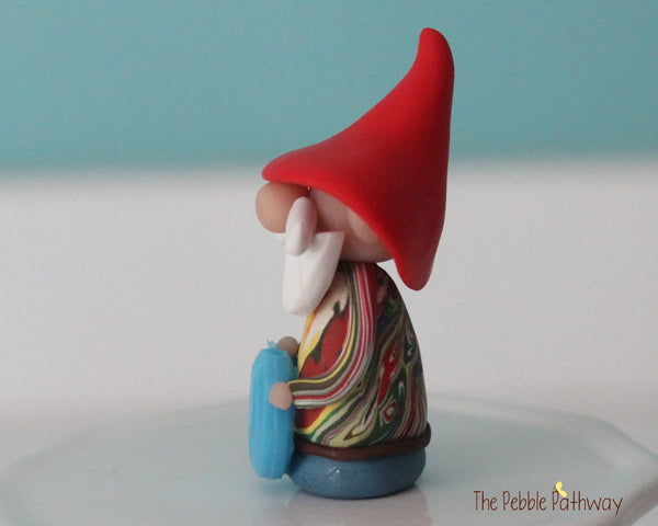 Hippie Gnome with tie dye shirt and blue peace sign