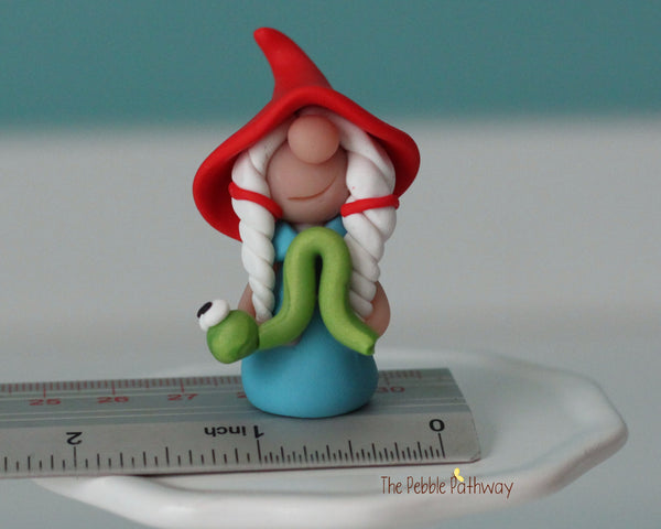 Miniature polymer clay Gnomette with inchworm - Girl gnome Shauna - ThePebblePathway