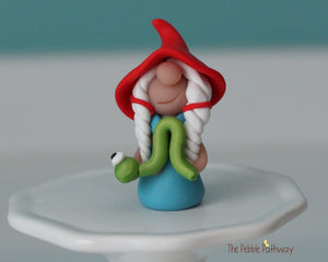 Miniature polymer clay Gnomette with inchworm - Girl gnome Shauna - ThePebblePathway