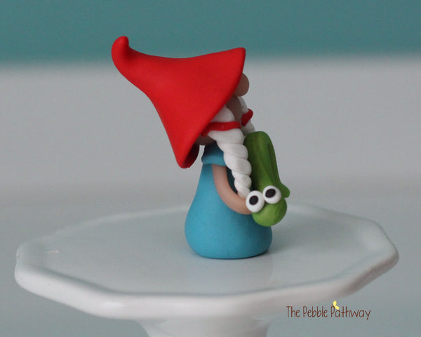 Miniature polymer clay Gnomette with inchworm - Girl gnome Shauna - ThePebblePathway