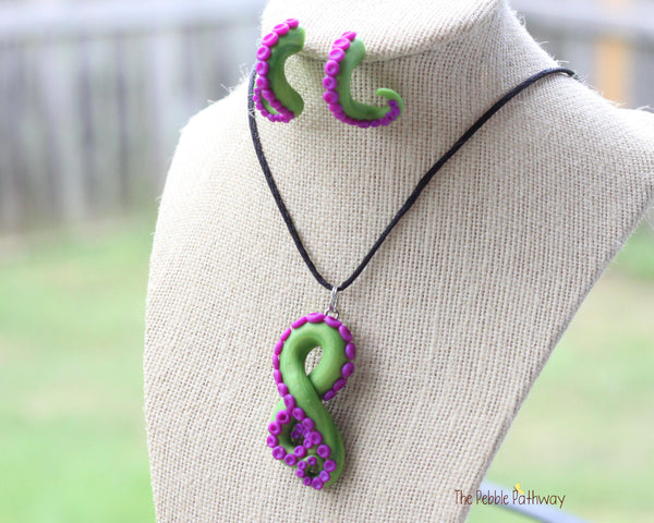 Green tentacle pendant and earrings with purple suckers, octopus themed jewelry