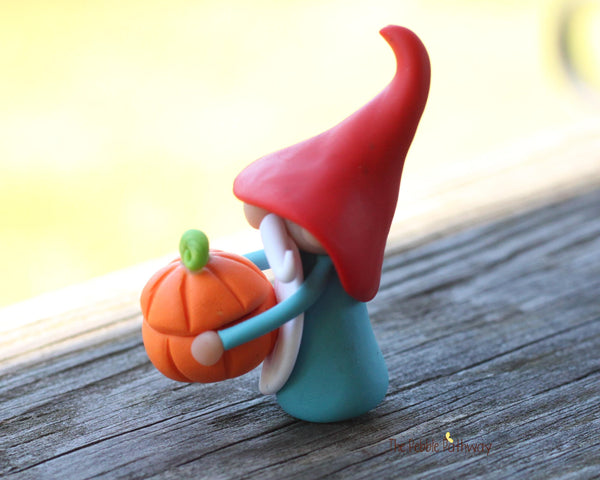 Gnome with pumpkin bowl full of apples - miniature garden gnome figure