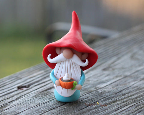 Gnome with pumpkin spice latte in tiny pumpkin cup - miniature garden gnome figure