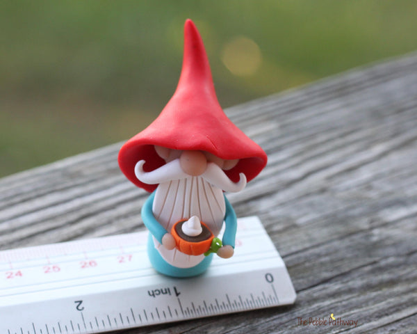 Gnome with pumpkin spice latte in tiny pumpkin cup - miniature garden gnome figure