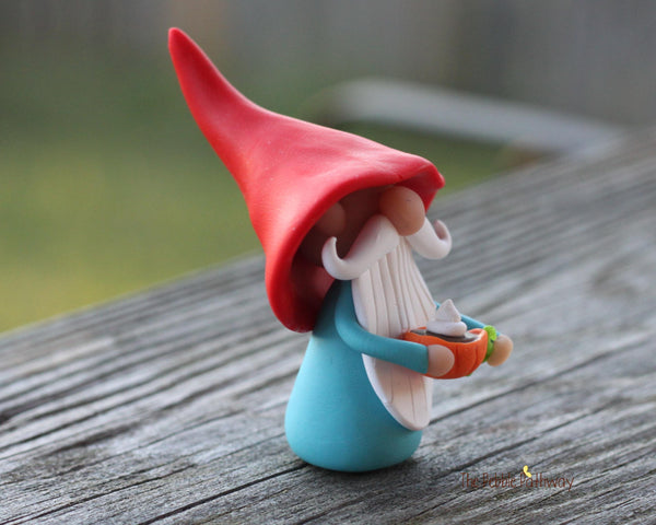 Gnome with pumpkin spice latte in tiny pumpkin cup - miniature garden gnome figure