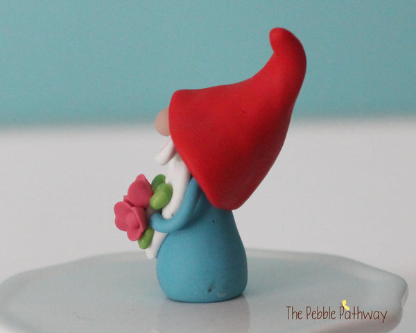 Gnome with bouquet of pink flowers - miniature garden gnome figure Dewitt