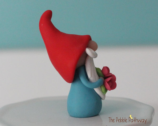 Gnome with bouquet of pink flowers - miniature garden gnome figure Dewitt