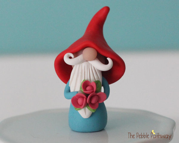 Gnome with bouquet of pink flowers - miniature garden gnome figure Dewitt