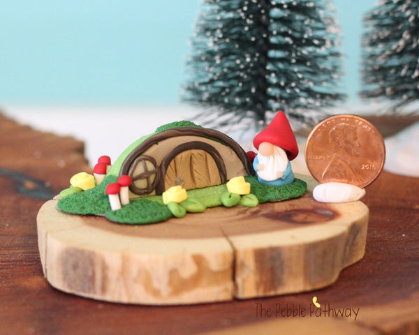 Micro mini gnome with tiny gnome home on cedar wood slice - ThePebblePathway