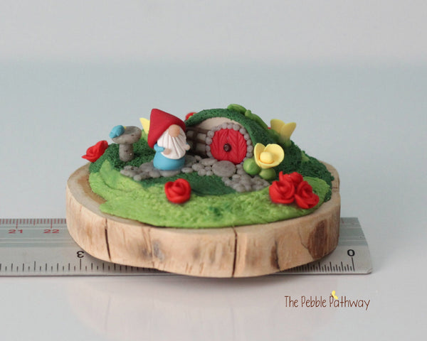 Micro mini gnome with tiny gnome home on cedar wood slice 2 - ThePebblePathway